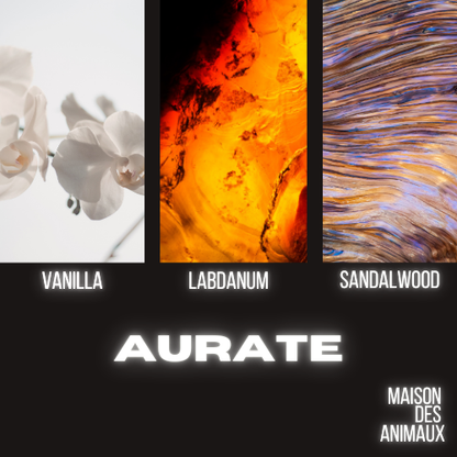 A triptych of images showing white orchids, an abstract orange and black texture, and colorful wood grain, presenting Aurate eau de parfum by Maison des Animaux with scent notes of Vanilla, Labdanum, and Sandalwood displayed below their corresponding images.